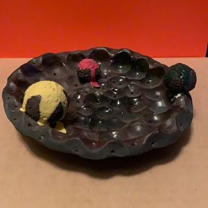 Chocolate ceramic cone ten art piece by AfroCanadian artist “G.” About 5 inches